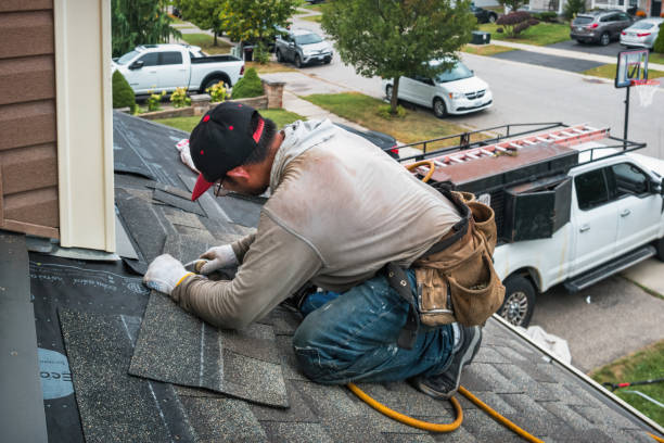 Professional Roofing technician working in Kensal, ND